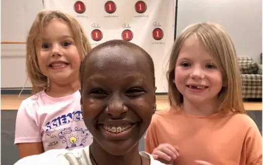 a group of girls smiling