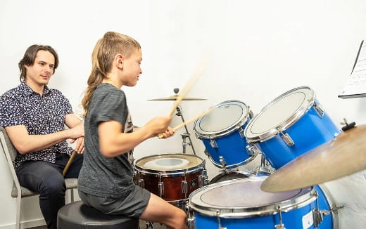 a person playing drums