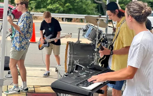 a group of people playing instruments