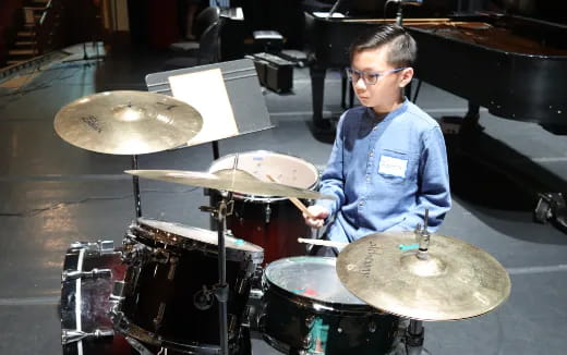 a man playing drums