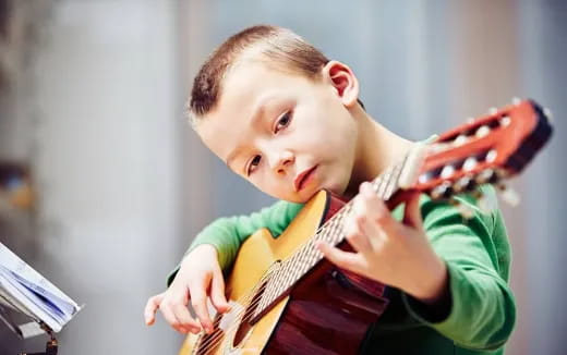 a boy holding a gun