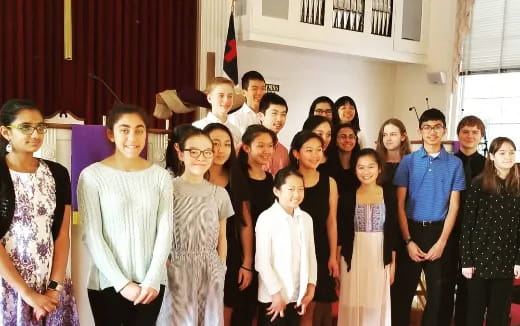 a group of people posing for a photo