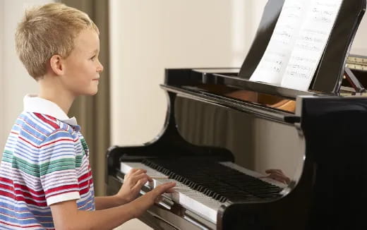 a child playing a piano