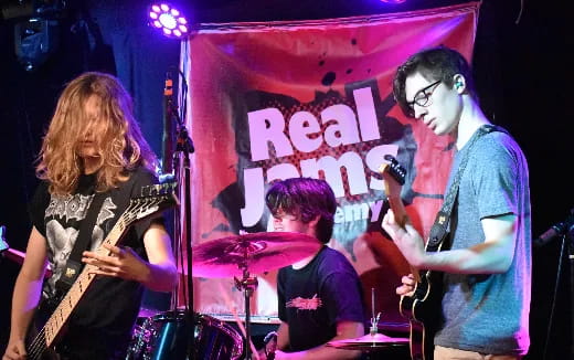 a group of people playing instruments