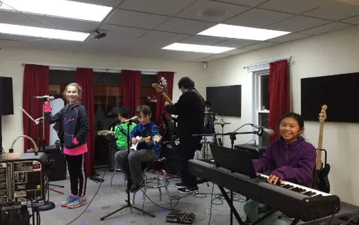 a group of people playing instruments