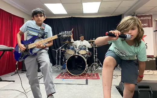 a man and a woman playing instruments