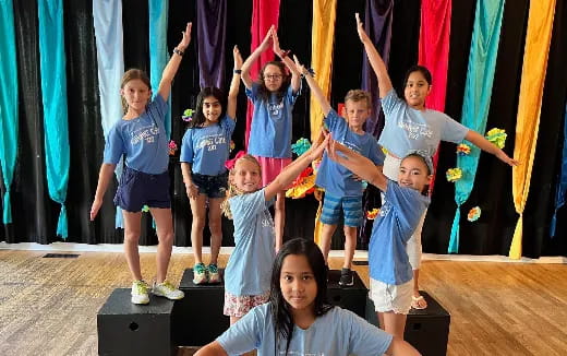 a group of children on a stage