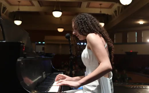 a person playing a piano