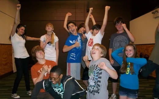 a group of people posing for a photo