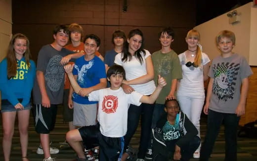 a group of people posing for a photo