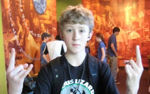 a person holding up two fingers