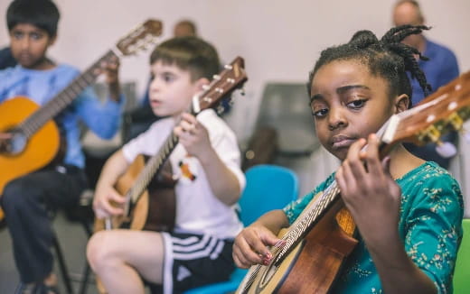 a group of people playing instruments
