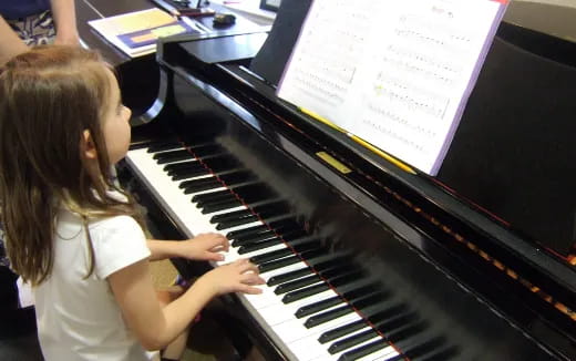 a child playing a piano