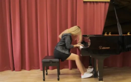 a person playing a piano