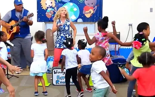 a group of children dancing