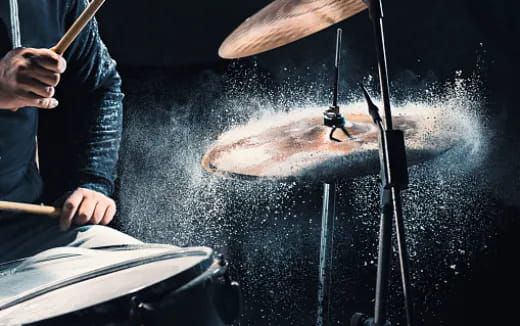 a man holding a fish