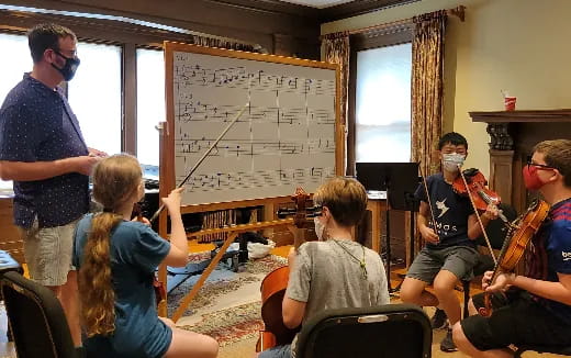 a group of people playing instruments