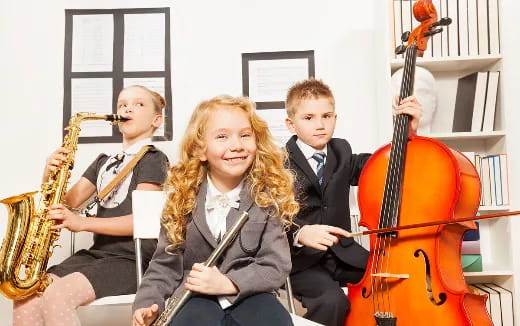 a group of kids playing instruments