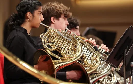a group of people playing instruments