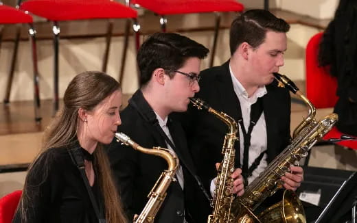 a group of people playing instruments