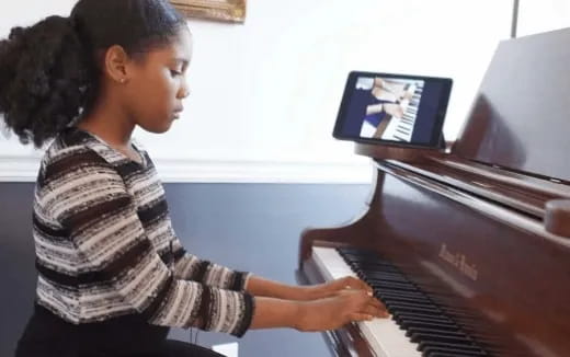 a person playing a piano