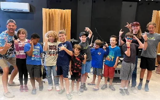 a group of people posing for a photo