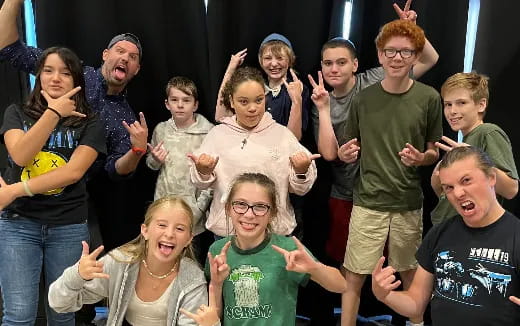 a group of people posing for a photo