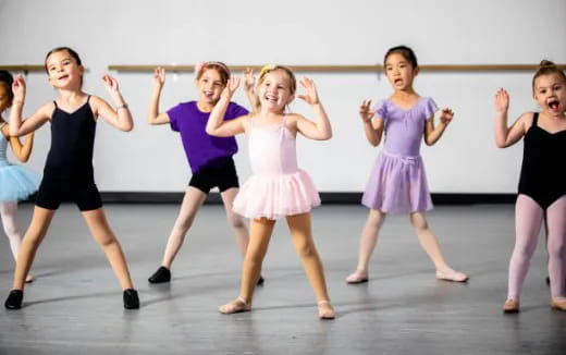 a group of girls dancing