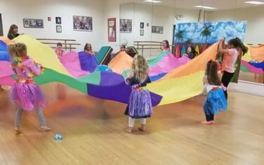 a group of children dancing