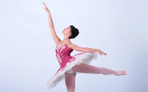 a person in a pink dress