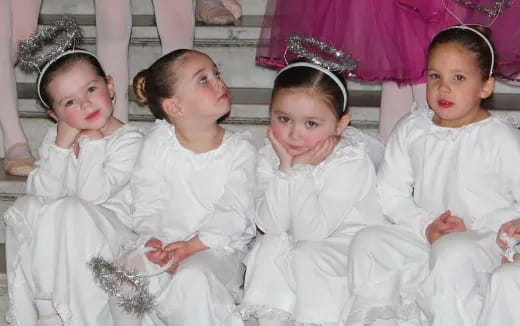 a group of children sitting together