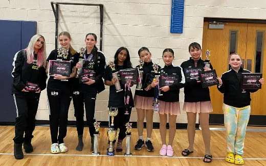 a group of women posing for a photo