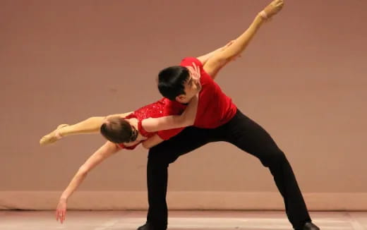 a man and woman dancing