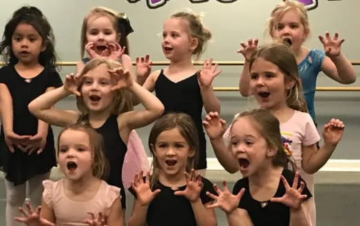 a group of children with their mouths open