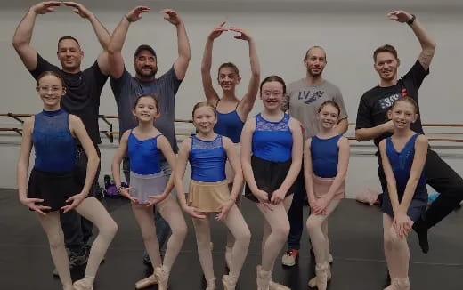 a group of people posing for a photo