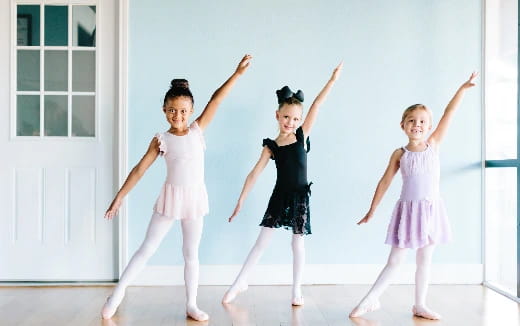 a group of children dancing