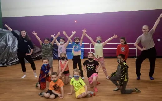 a group of children posing for a photo