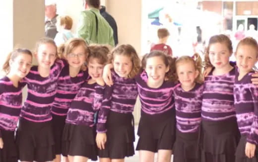 a group of children posing for a photo