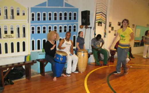 a group of people playing drums