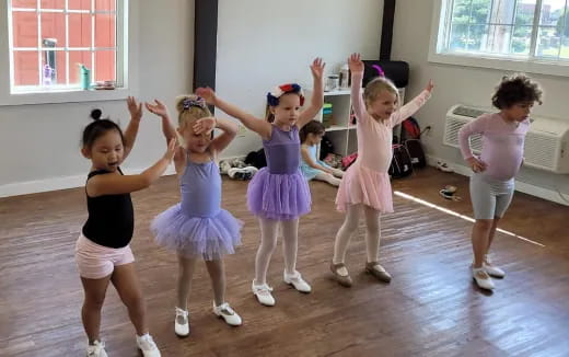 a group of children dancing