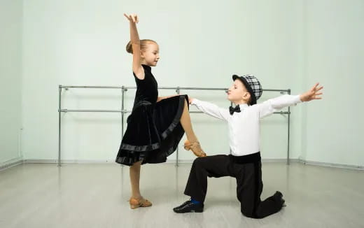 a man and woman dancing