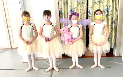 a group of girls wearing clothing