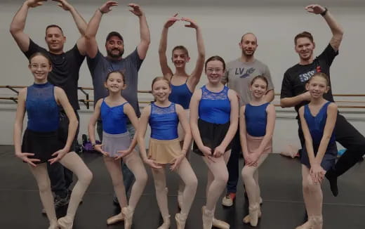 a group of people posing for a photo