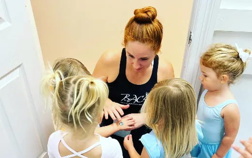 a group of girls in a room