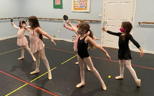 a group of girls dancing