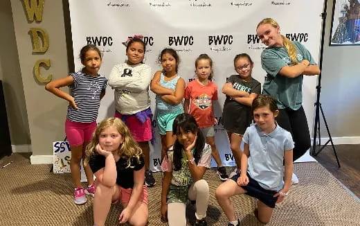 a group of people posing for a photo