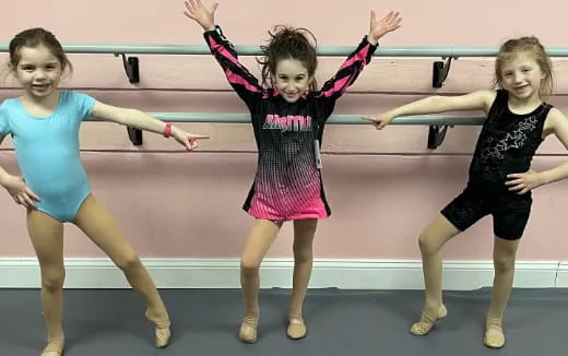 a group of girls dancing