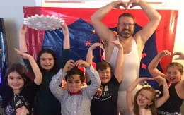 a group of people posing for a photo