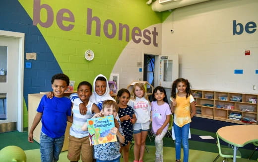 a group of people posing for a photo