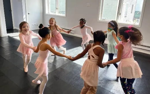 a group of children dancing